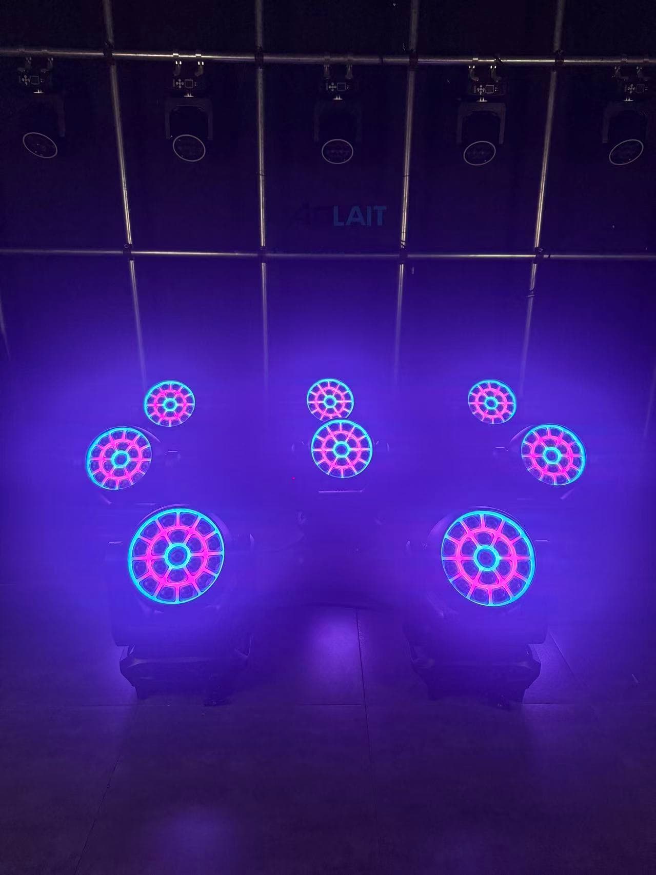 Aolait AL1950WX moving heads showing cyan and magenta face effects in haze