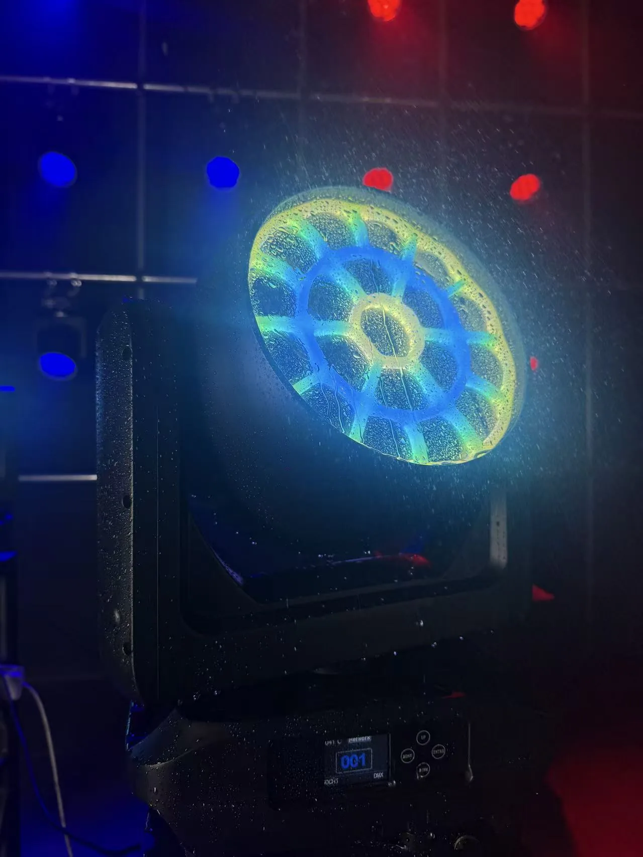 Aolait AL1950WX LED wash moving head with droplets visible across the illuminated front window
