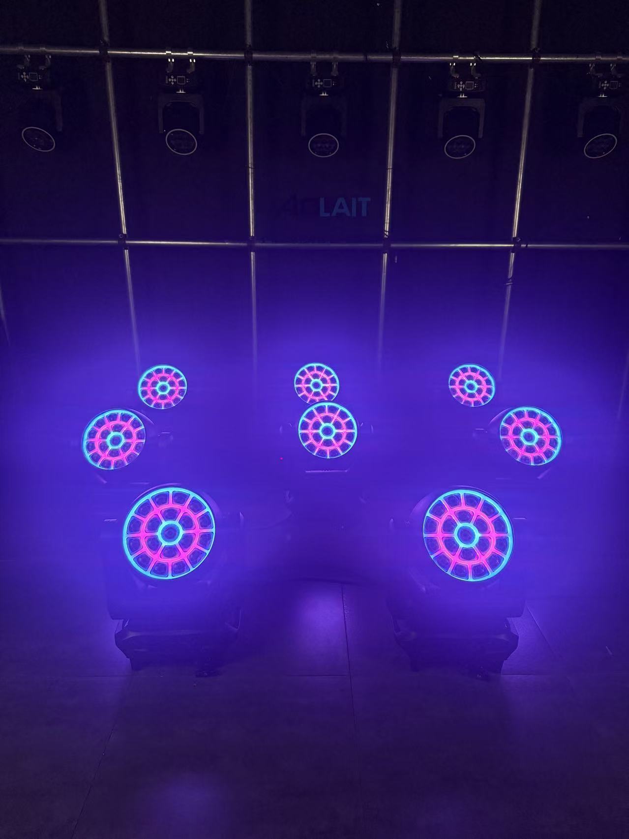 Aolait AL1950WX moving heads showing cyan and magenta face effects in haze