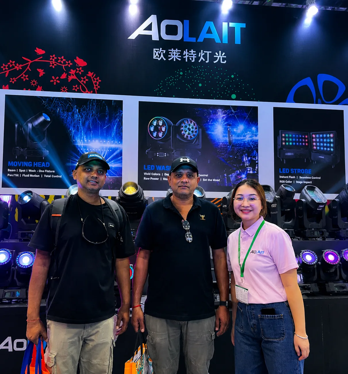 Aolait team meeting lighting professionals at an industry exhibition