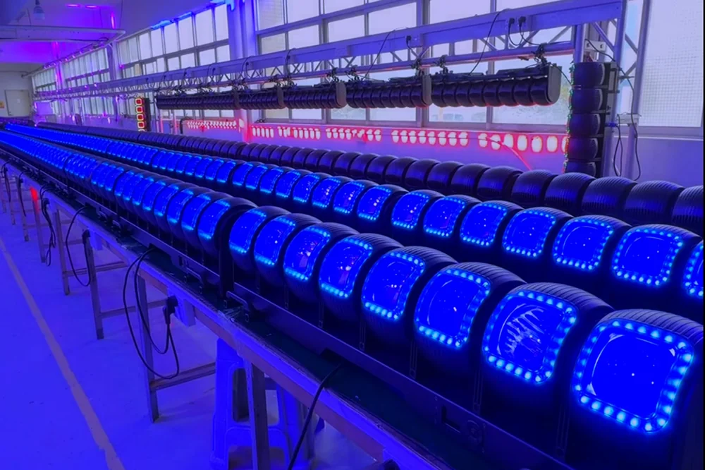 Rows of Aolait LED moving heads operating during a recorded factory aging test
