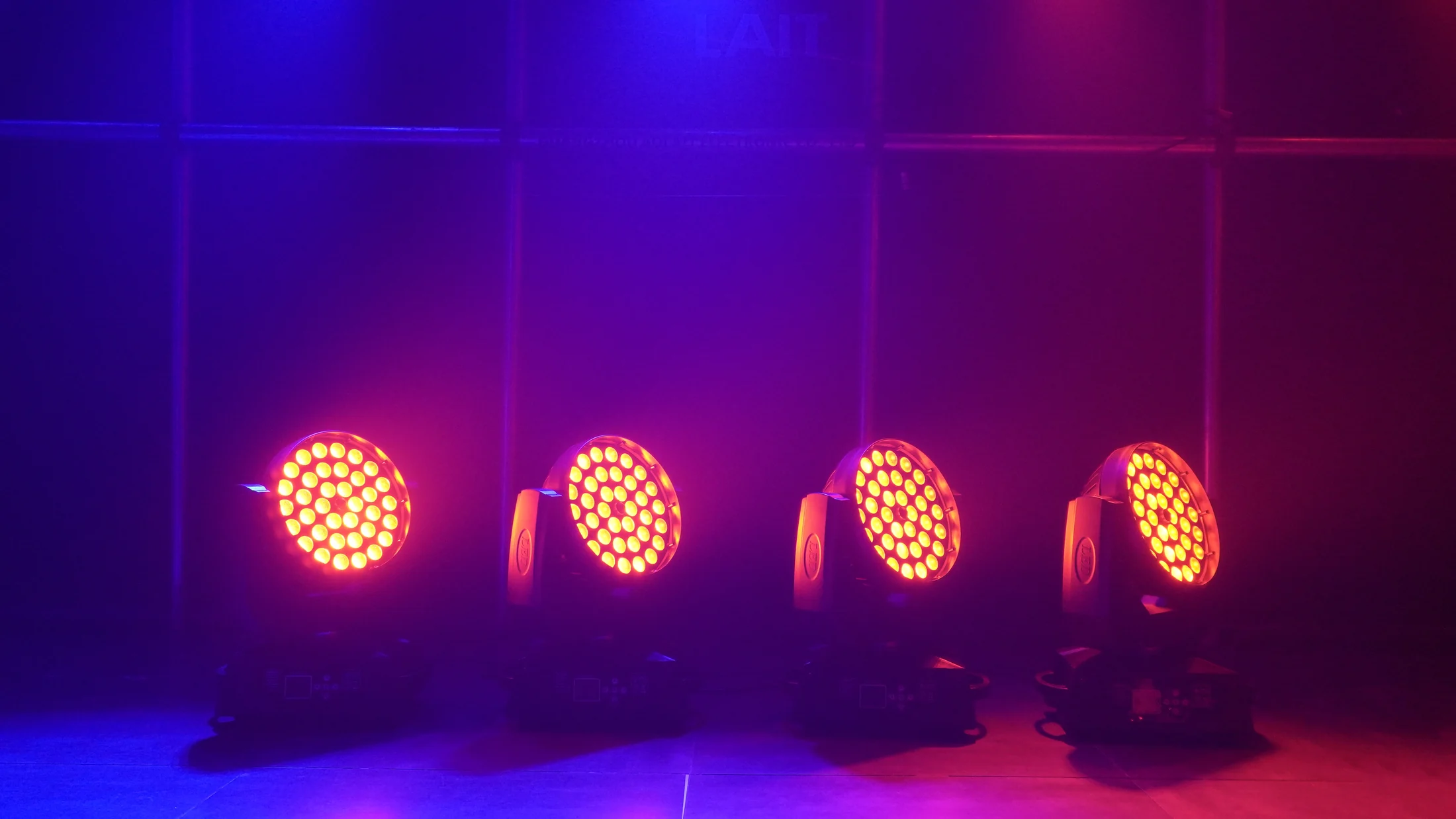 Four AL1036WZ fixtures illuminated during a controlled product demonstration